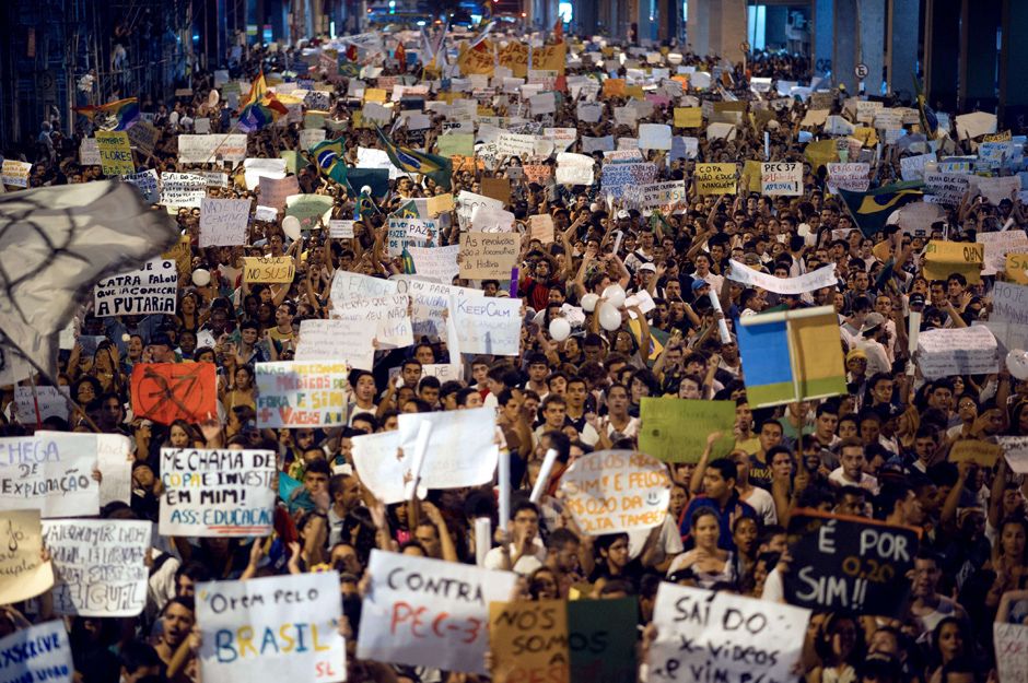 People rally late on June 19, 2013 in the center of Niteroi, 10 kms from Rio de Janeiro. Protesters battled police late on June 19, even after Brazils two biggest cities rolled back the transit fare hikes that triggered two weeks of nationwide protests.